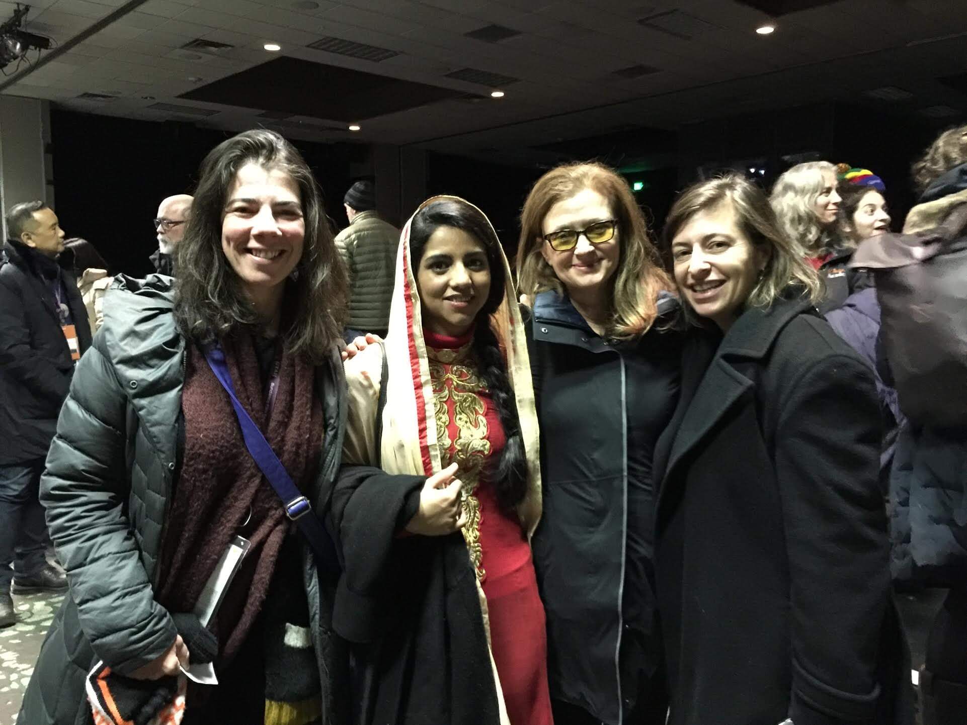 Executive Director Jenni Wolfson, Co-Founder Wendy Ettinger, and Co-Founder Julie Parker Benello with Sonita Alizadeh at a Sundance screening of SONITA
