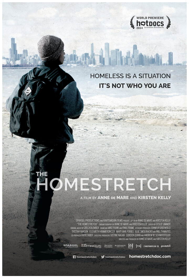 A poster for the film, "The Homestretch". A photo of a person standing on the shore of a beach, looking at a cityscape across the water. They are wearing a knit hat, winter jacket, and backpack. The graphic text in the top right-hand corner reads: "Homeless in is a situation, its not who you are". The title text reads: "The Homestretch: A film by Anne De Mare and Kirsten Kelly".