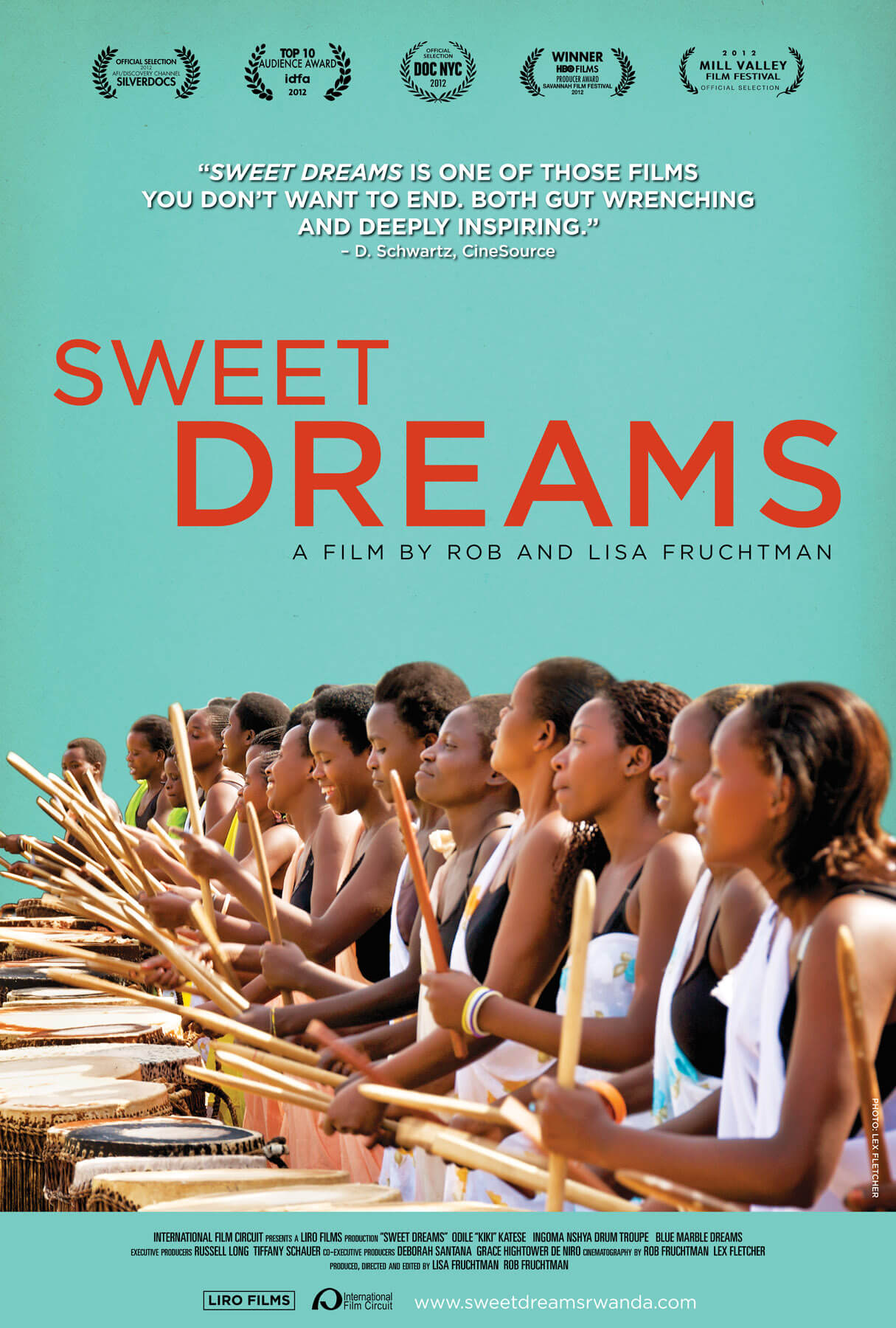 Graphic of the poster for Sweet Dreams. Starting in the bottom right hand corner, a line of women holding drumsticks, arms bent, mid drum-strike over stomach-height wooden drums stretches from the foreground into the background. The background is an artificial turqoise. All of the women are wearing black tank tops and a patterned one-shoulder wrap overtop.