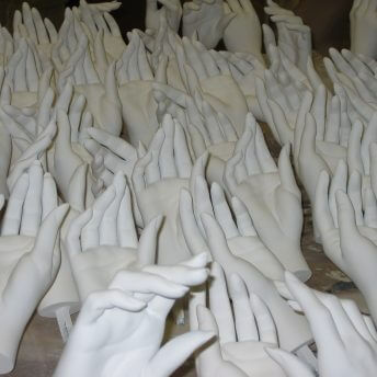 Mannequins hands with no painting, they are all white.