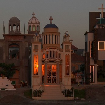 An extravagant grave, with domes and lights.