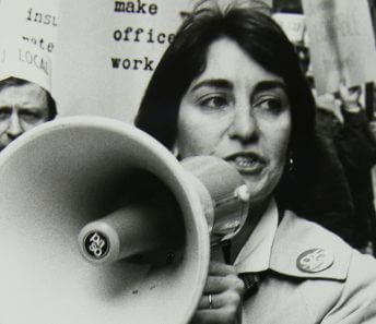Karen Nussbaum on the megaphone at Local 925 protest