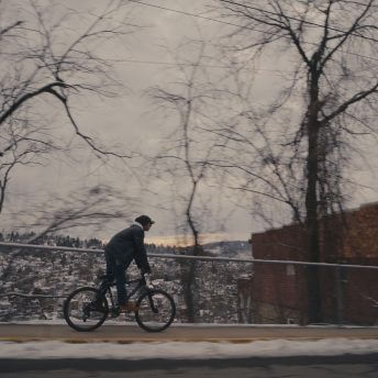 Ryan rides his bike to work in a wintry Morgantown, West Virginia.