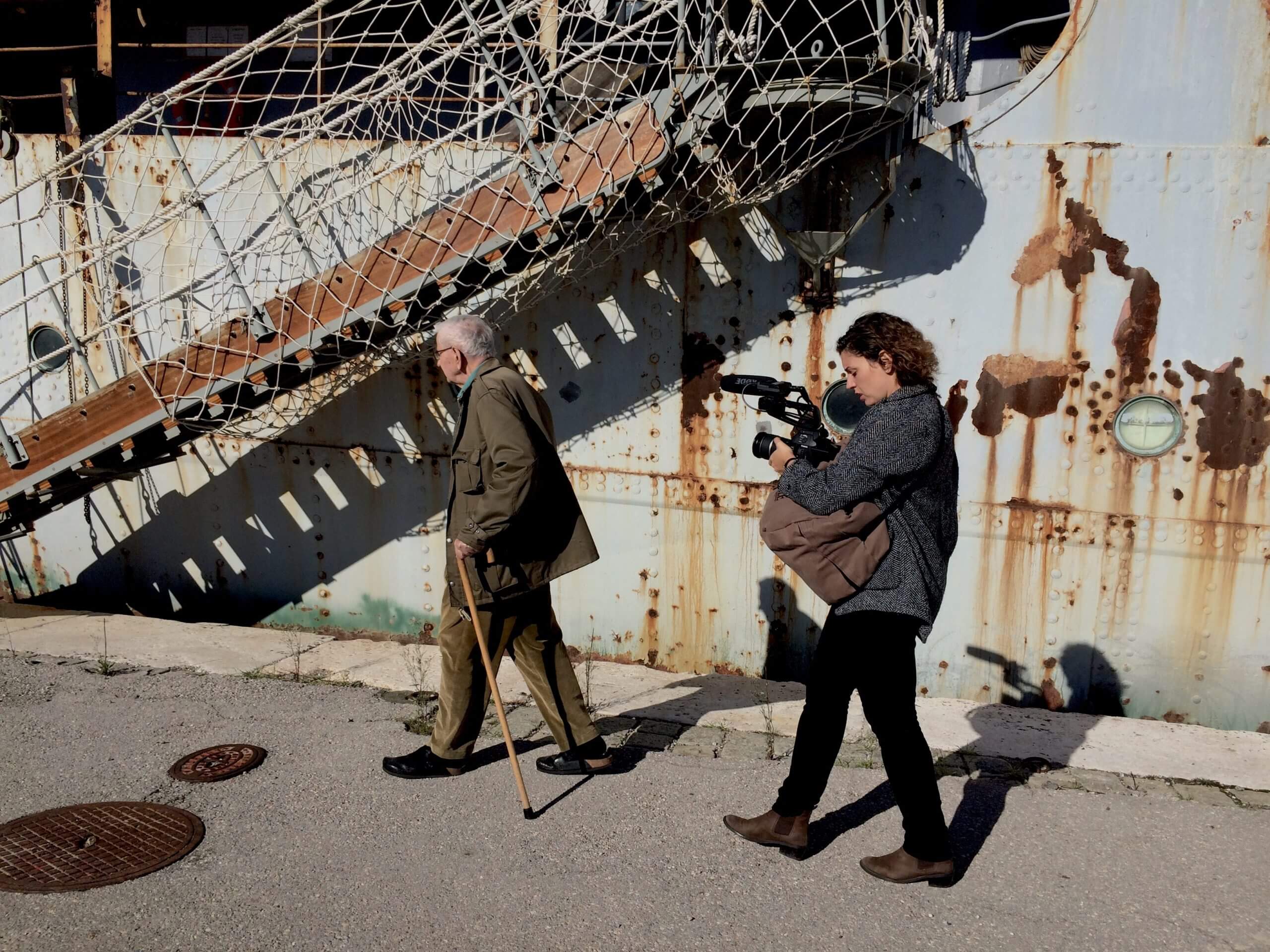 Mila Turajlić and Stevan Labudović visiting the decaying ship of Yugoslav President Tito during filming.