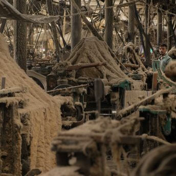 Old machines covered with jute bags