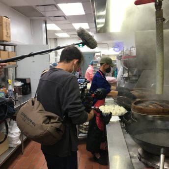 Crew filming in the kitchen of Kam Wai Dim Sum in Vancouver's Chinatown