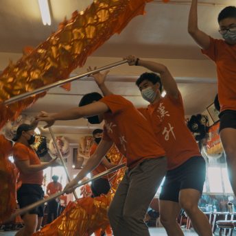 Members of the Hon Hsing Athletic Club in Vancouver Chinatown practice an ancient dragon dance.
