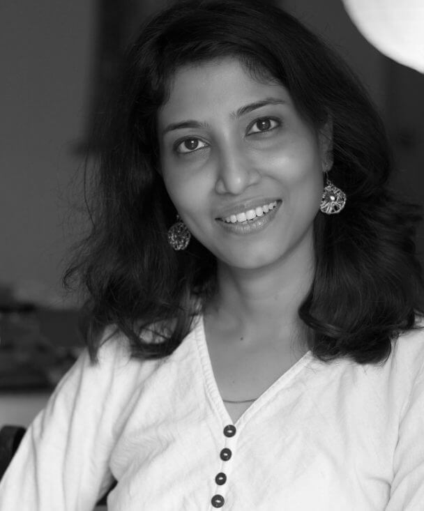 Triparna Banerjee is the Impact Producer on From the Shadows. Black and white headshot.