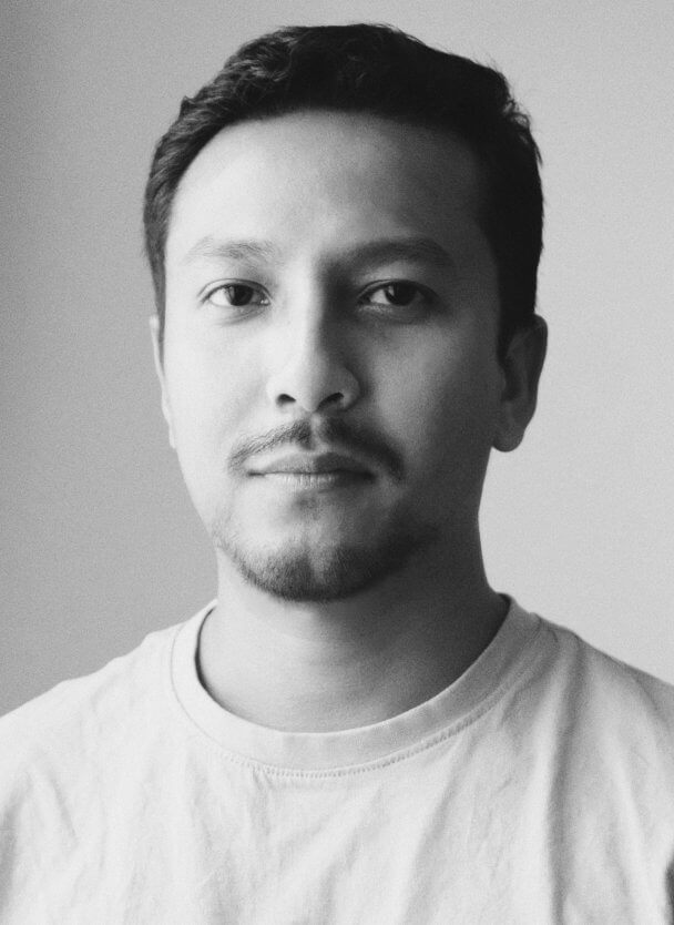 Director Akash Basumatari portrait in black and white.